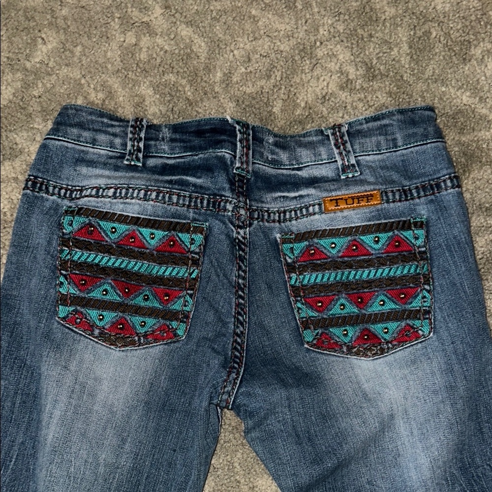 Cowgirl Tuff Co. Blue and Red Jeans with Southwestern Embroidery